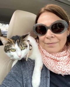 Phebe Phillips and Cat TillySue in the car