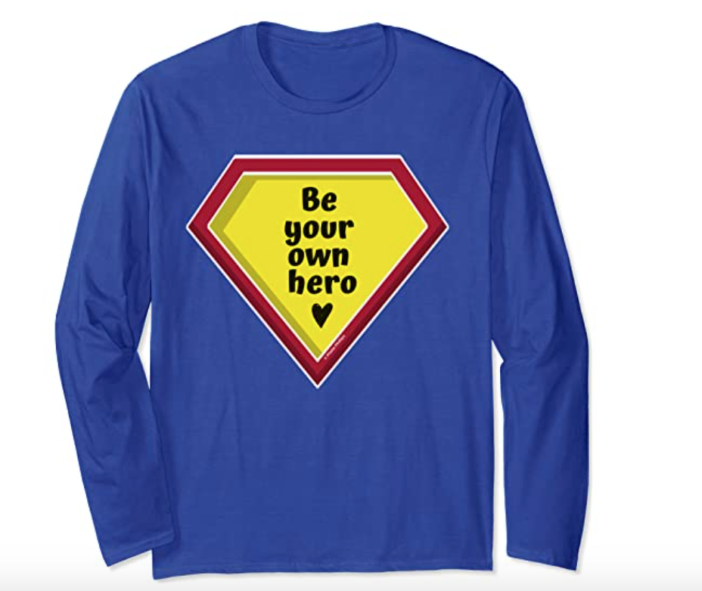 Be Your Own Hero T-Shirt by Phebe Phillips on Amazon